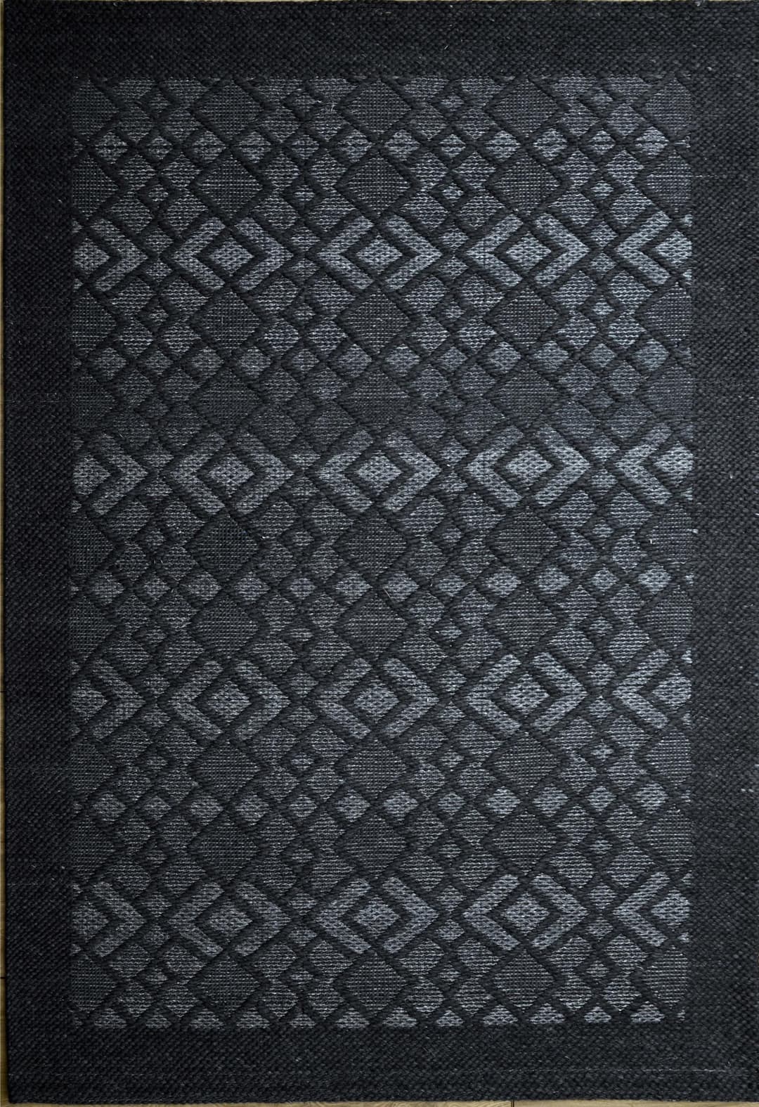 A Charcoal, Grey flat weave product