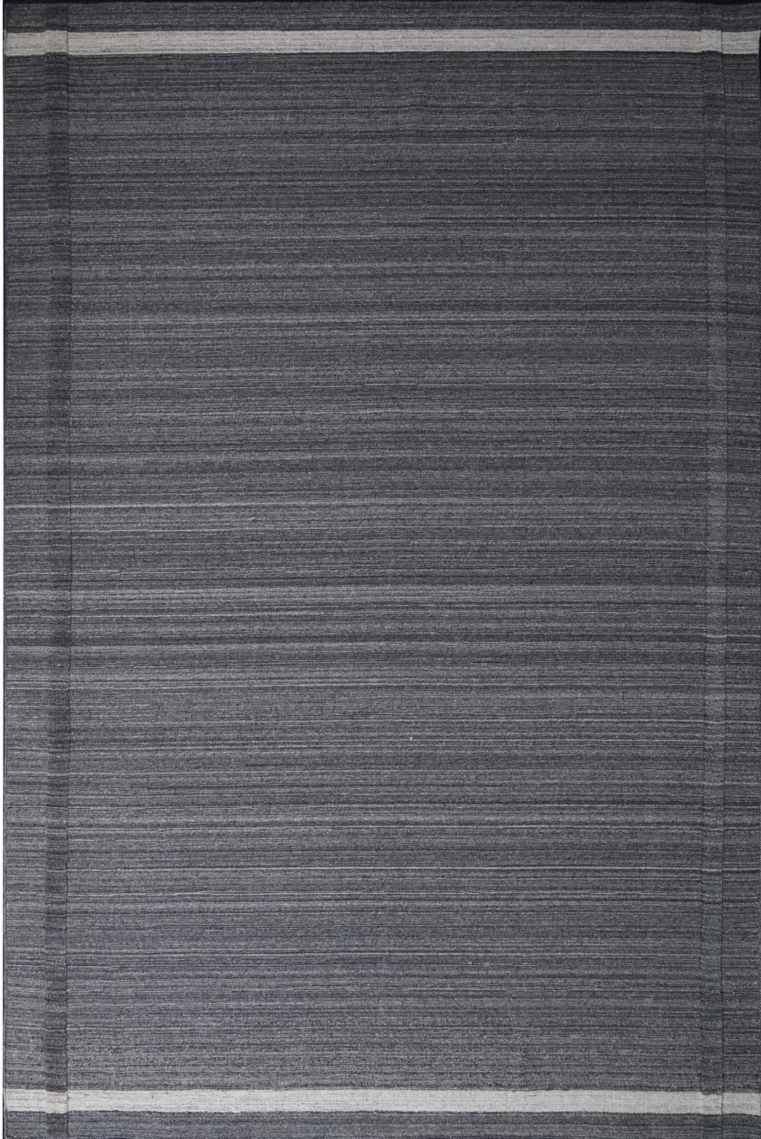 A Grey flat weave product